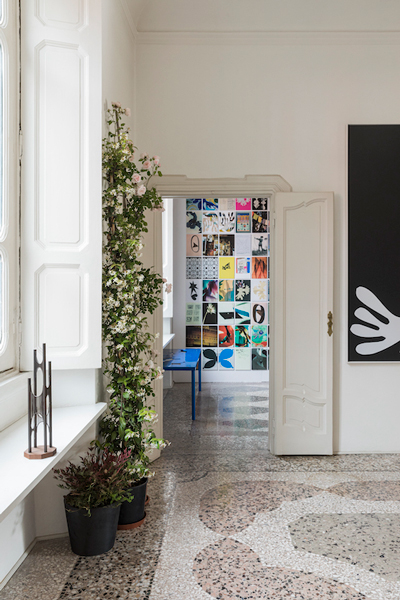 3 View into the third gallery featuring 200 images of Lucias work photographs portraits and more. in addition Windharp on left shelf Swooping Corner Bird on right and blue Cloud Bench in background