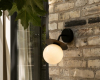 Nuura Liila Wall Outdoor Black Opal lifestyle 2 Gartenleuchten Wand decohome.de