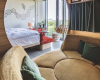 Bikini Berlin 25 hours zimmer durchblick berliner zoo sofalandschaft(K AISSLINGER2502 6742 Whitelight Studio Jens Boesenberg) decohome.de
